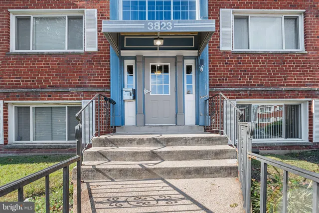 a front view of a house with a outdoor view