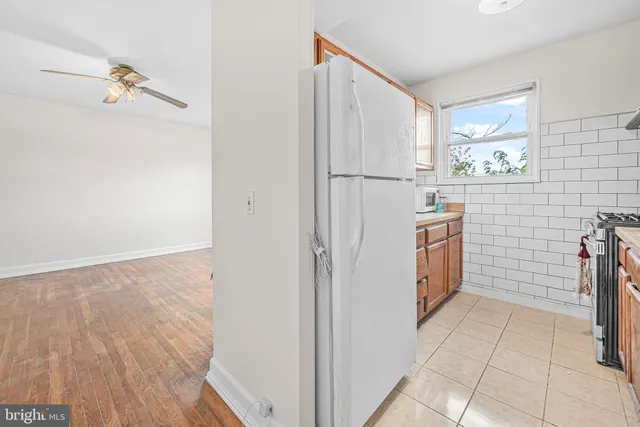 a view of a kitchen with sink and dishwasher