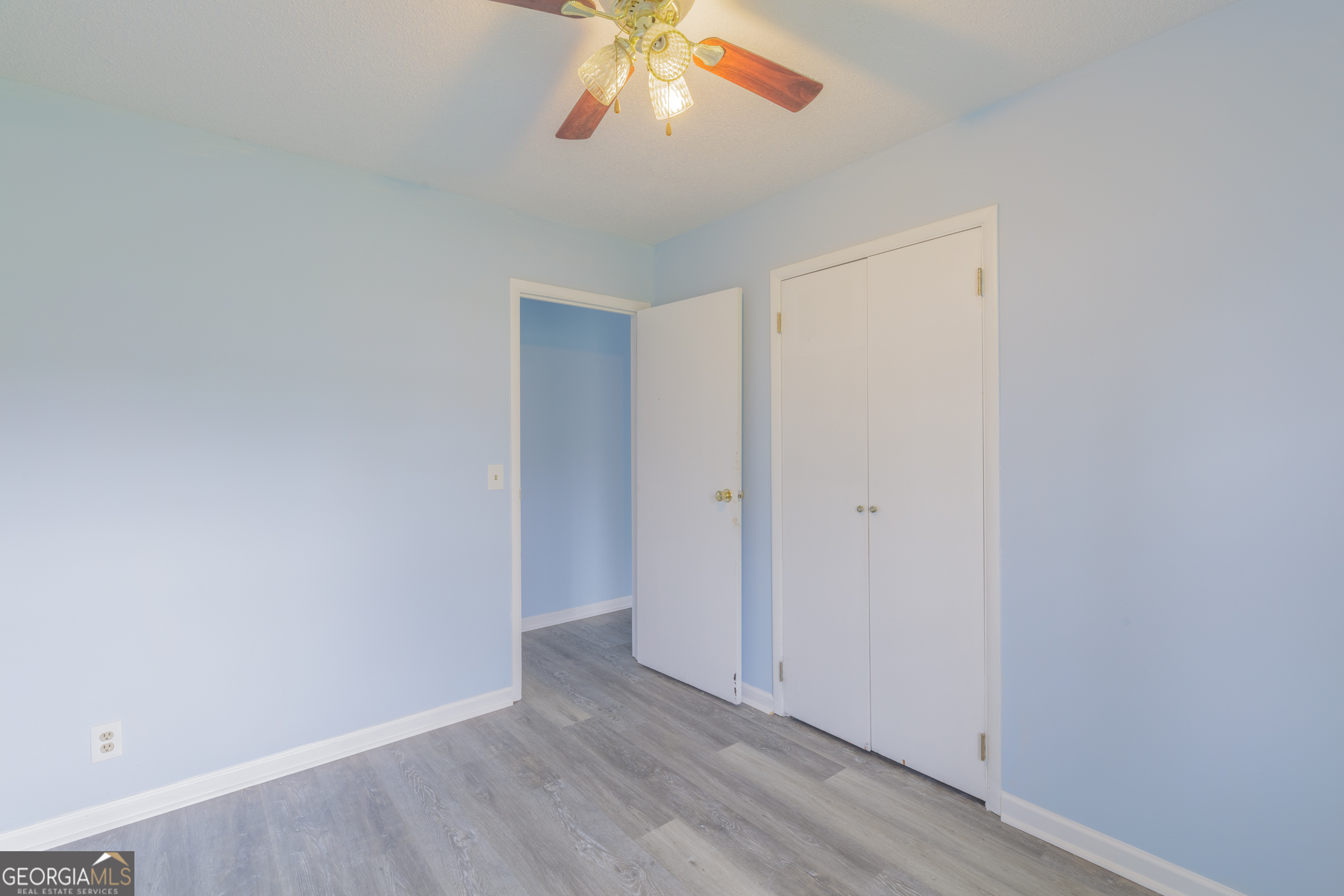 395 Wisteria Road LaFayette, GA 30728 - Photo 11 of 31 a view of an empty room with wooden floor and a window