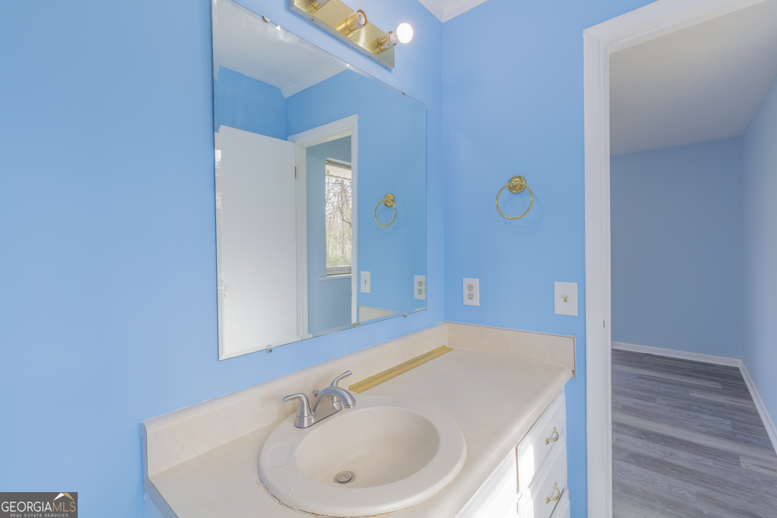 395 Wisteria Road LaFayette, GA 30728 - Photo 17 of 31 a bathroom with a sink and a mirror