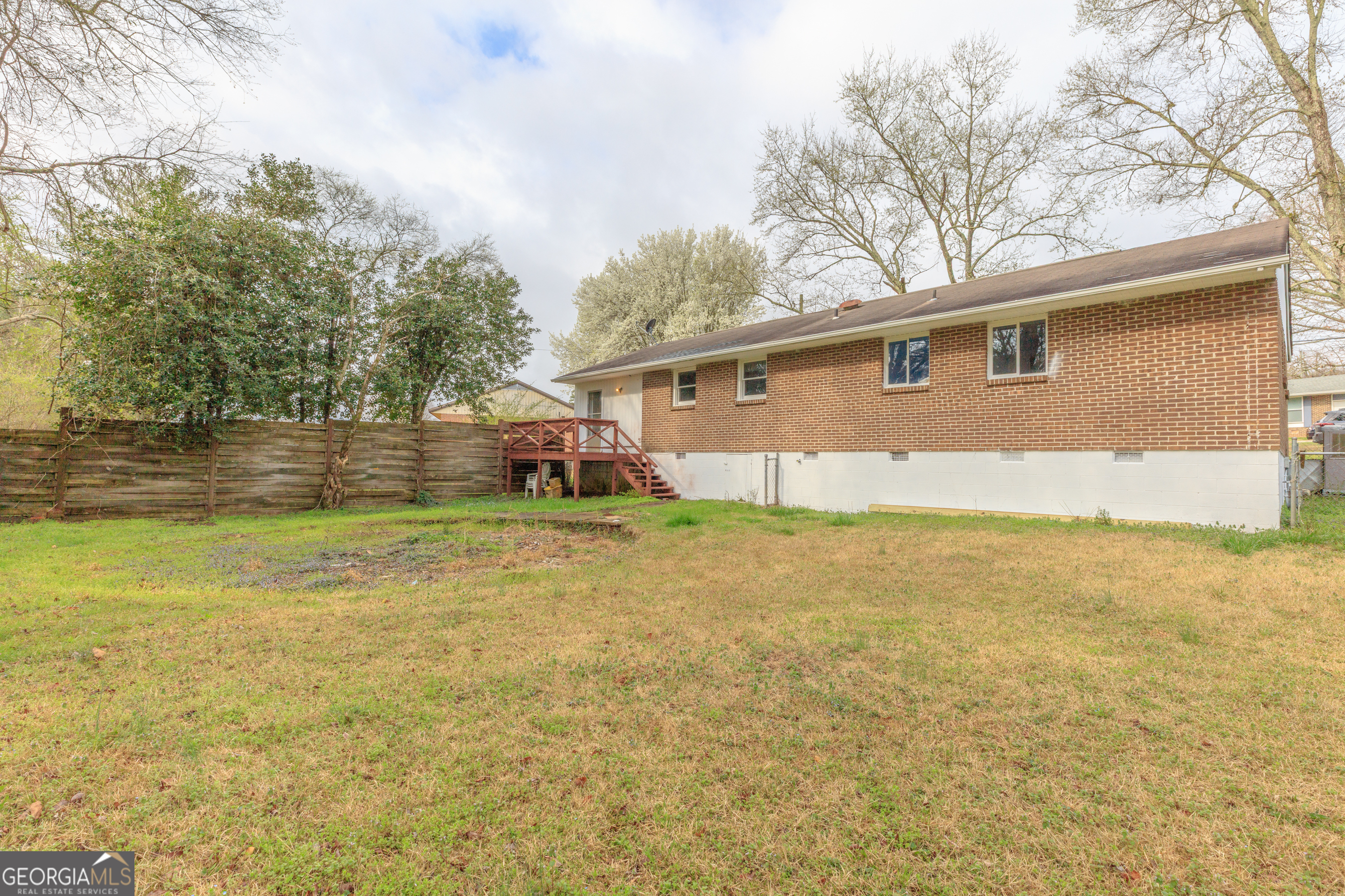 395 Wisteria Road LaFayette, GA 30728 - Photo 26 of 31 a view of a yard with a house and a large tree