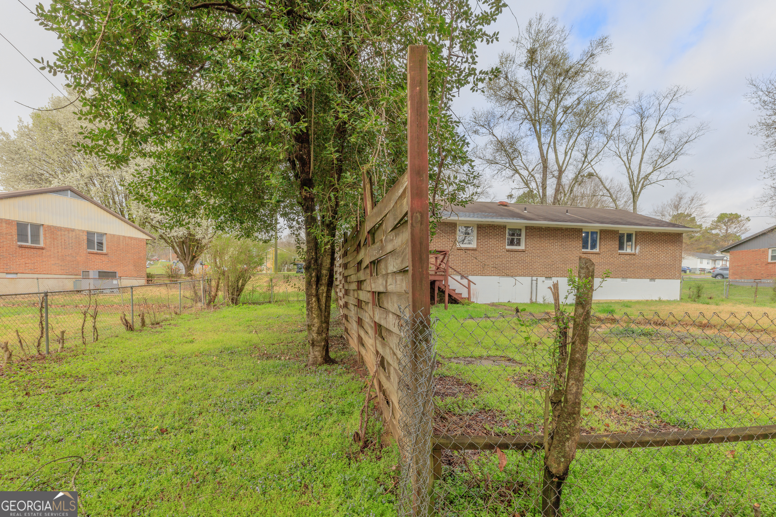 395 Wisteria Road LaFayette, GA 30728 - Photo 30 of 31 a view of a yard in front of a house with a large tree