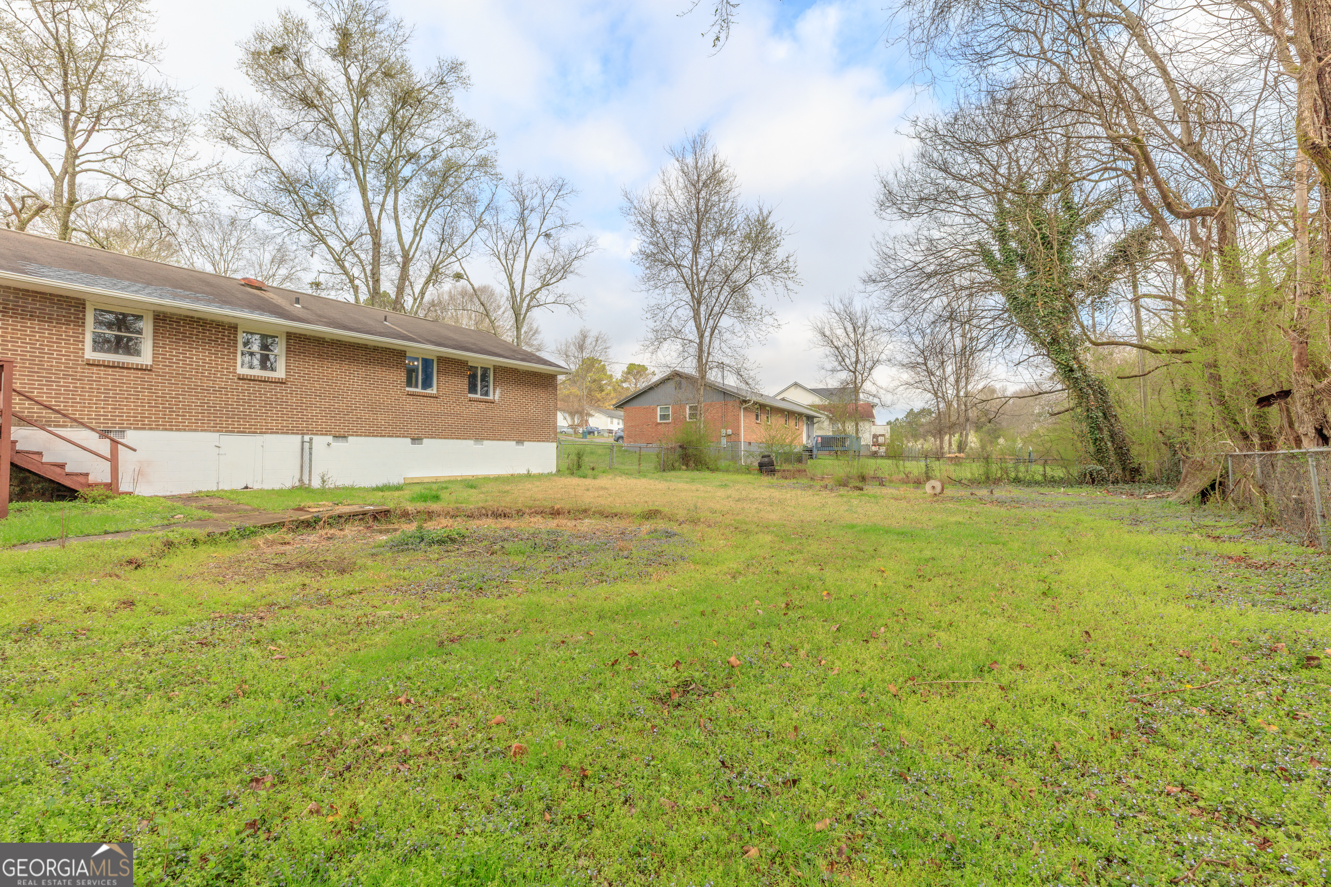 395 Wisteria Road LaFayette, GA 30728 - Photo 31 of 31 a view of a yard with a house