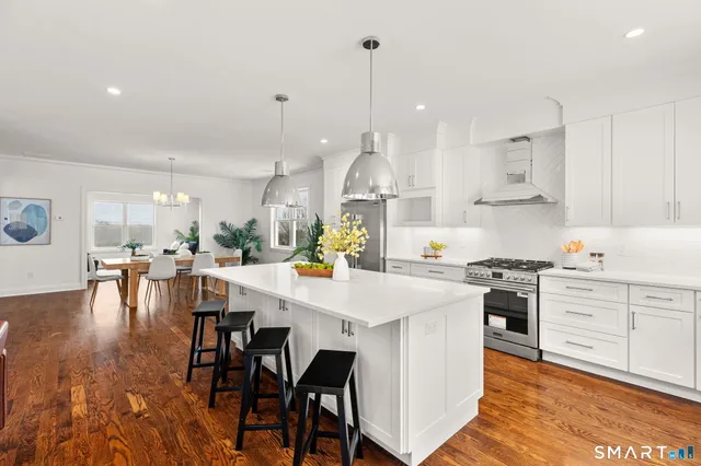 a picture of a bathroom with a shower