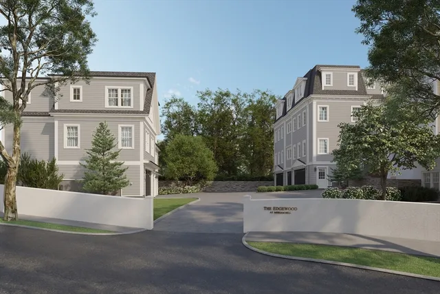 a front view of a house with tree s