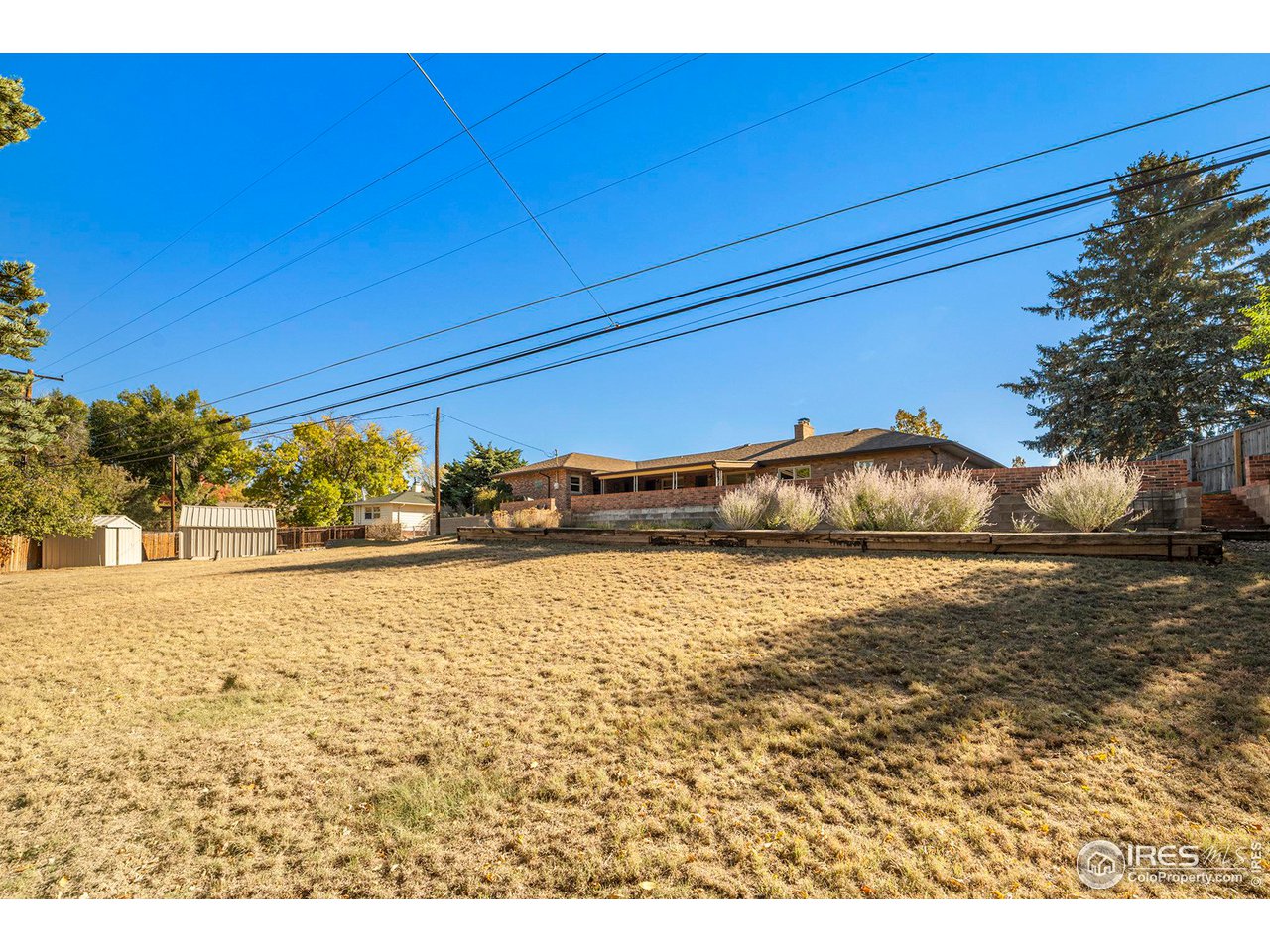 2425 Sunset Lane Greeley, CO 80634 - Photo 20 of 28 a view of an ocean and beach