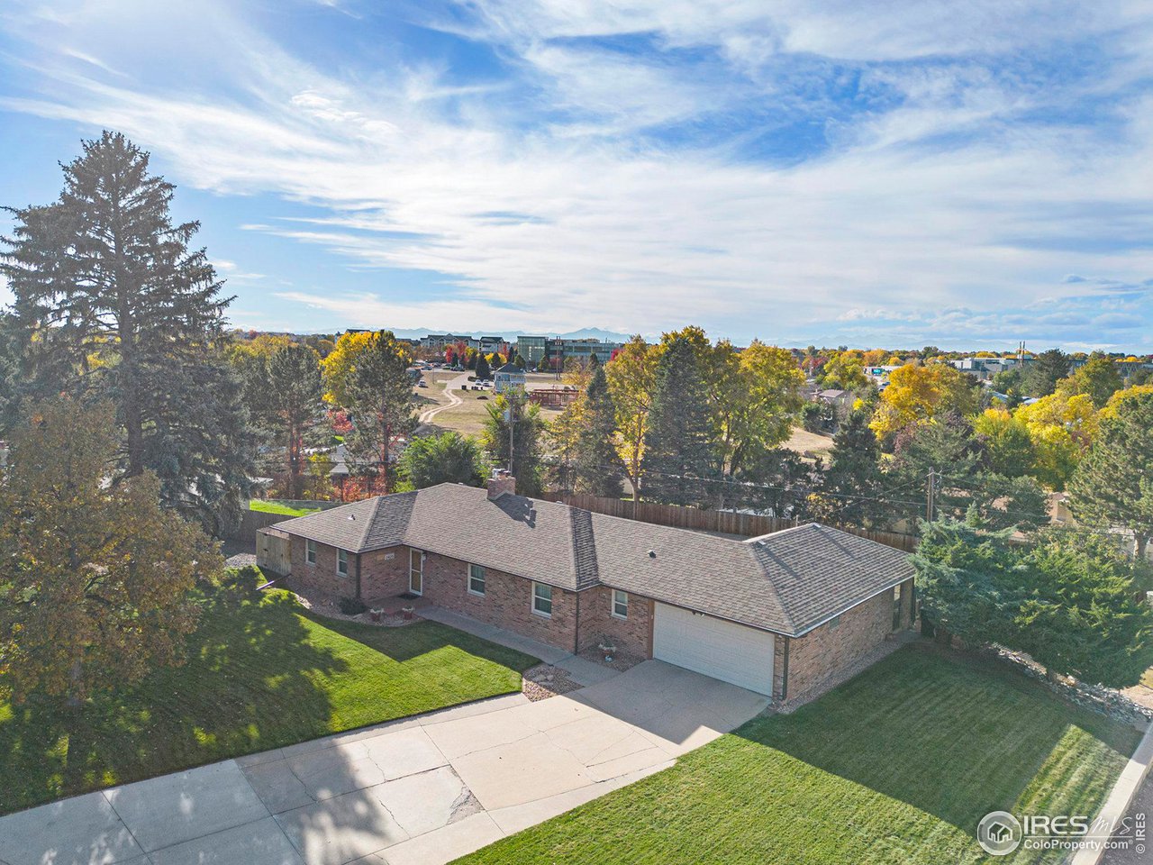 2425 Sunset Lane Greeley, CO 80634 - Photo 2 of 28 a view of a terrace with couches and sky view