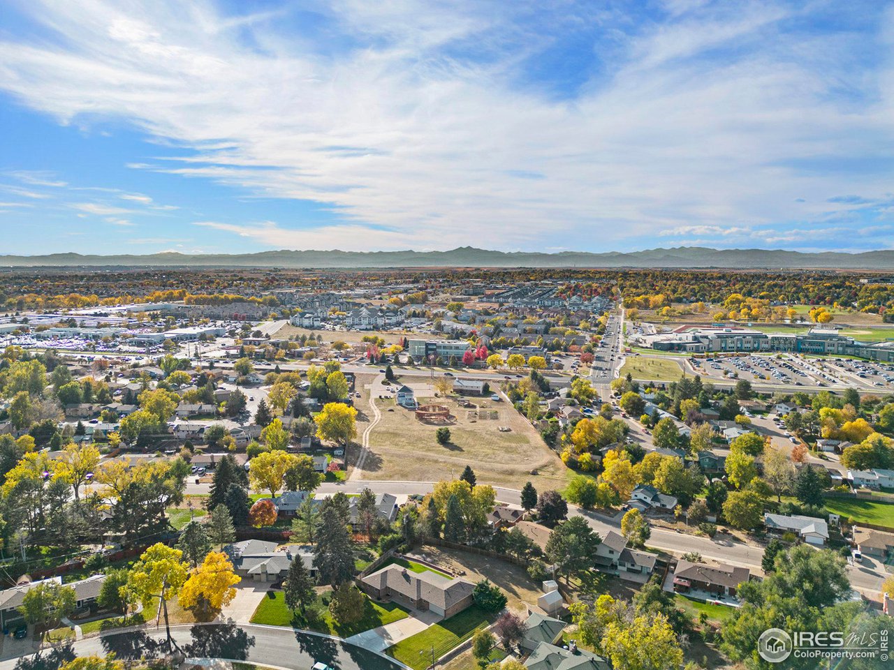 2425 Sunset Lane Greeley, CO 80634 - Photo 23 of 28 an aerial view of residential building and city