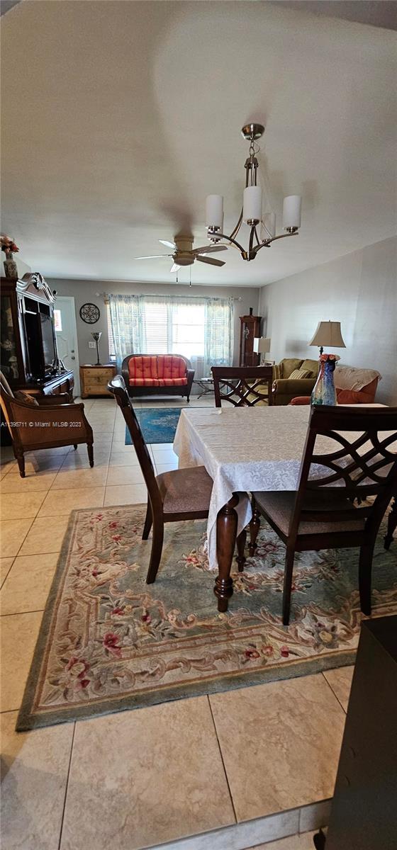 Lauderdale West Plantation Plantation, FL 33322 - Photo 11 of 17 a room with gym equipment and wooden floor