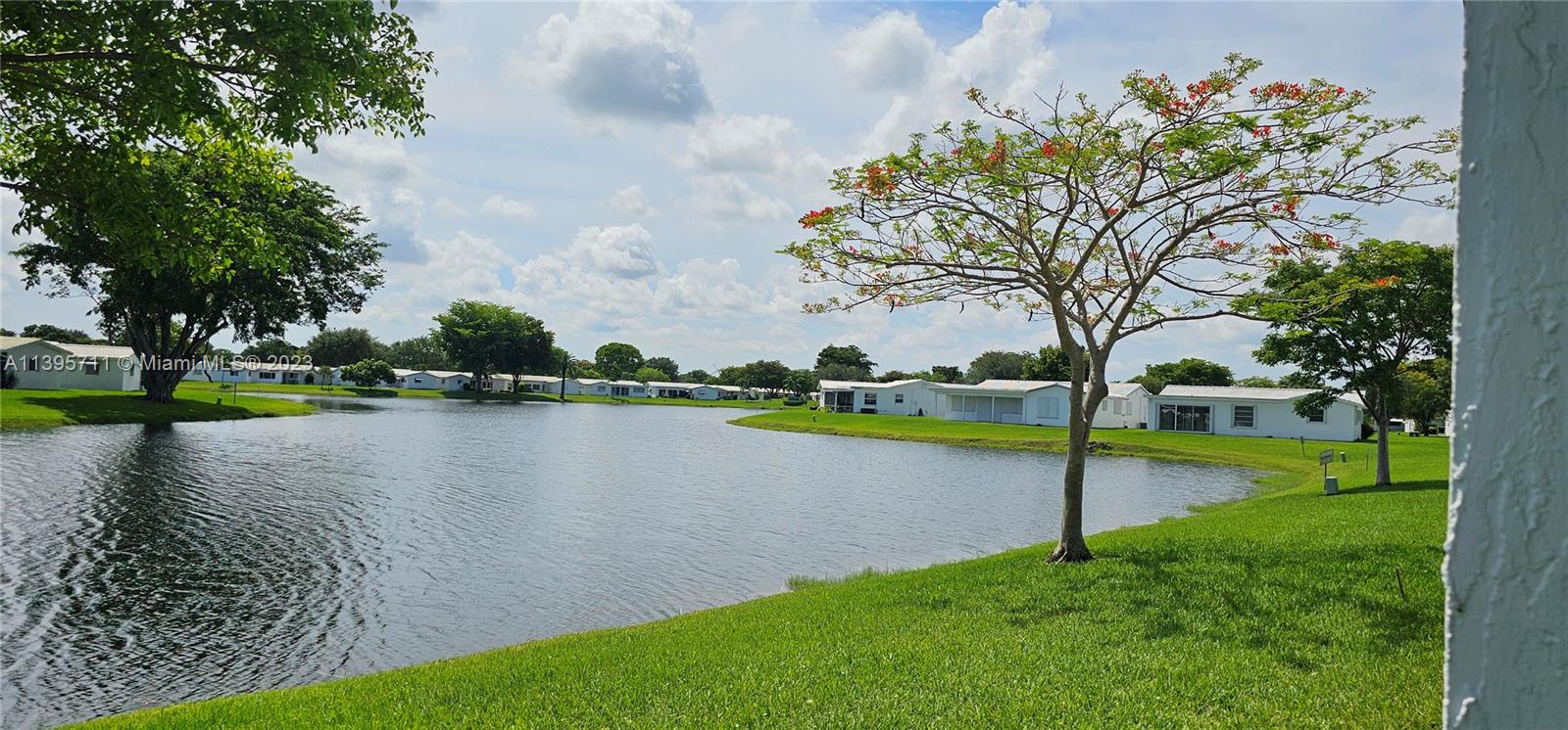Lauderdale West Plantation Plantation, FL 33322 - Photo 4 of 17 a view of a lake with houses