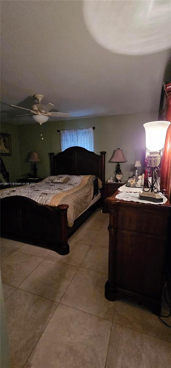 Lauderdale West Plantation Plantation, FL 33322 - Photo 10 of 17 a bedroom with a bed and a closet