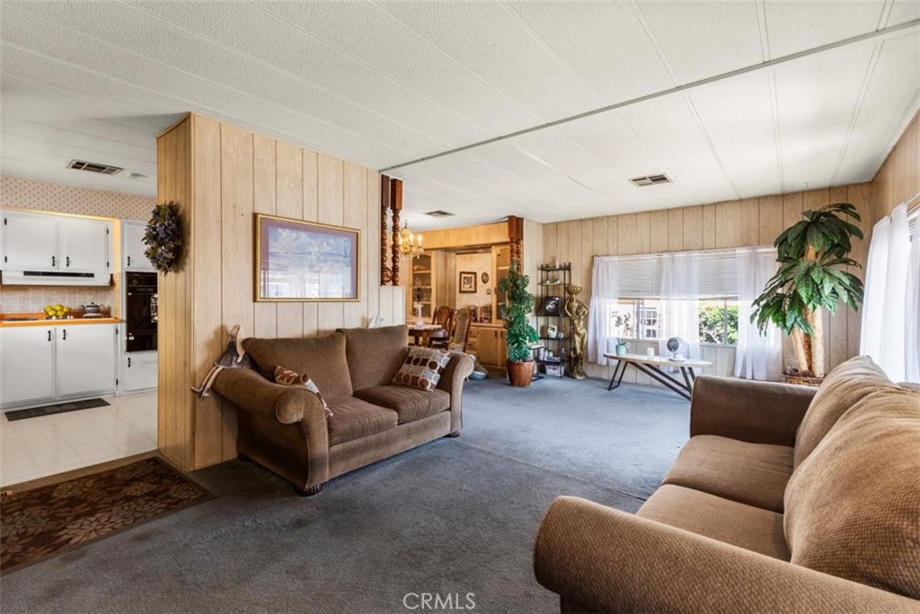 300 North Rampart Street, Unit 42 Orange, CA 92868 - Photo 8 of 37 Virtually Staged: Living Room Wide Shot