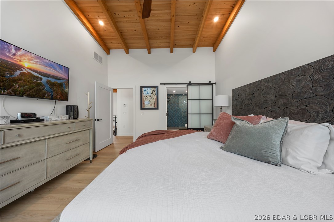 1151 Oak Road Osage Beach, MO 65065 - Photo 23 of 63 Bright and spacious bedroom with contemporary fini