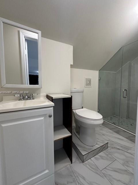 274 East 9th Street, Unit 4 Hialeah, FL 33010 - Photo 9 of 15 a bathroom with a toilet a sink and mirror