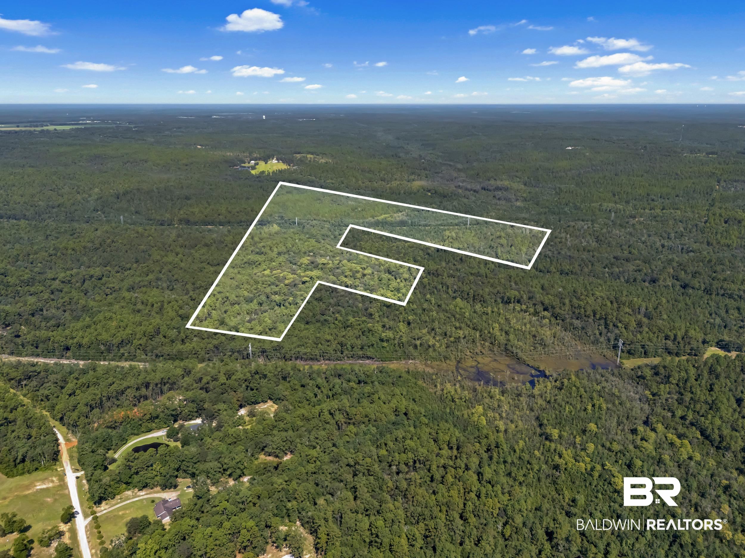 0 Arden Road Chunchula, AL 36521 - Photo 1 of 18 Aerial overview of property's location with property parcel outlined