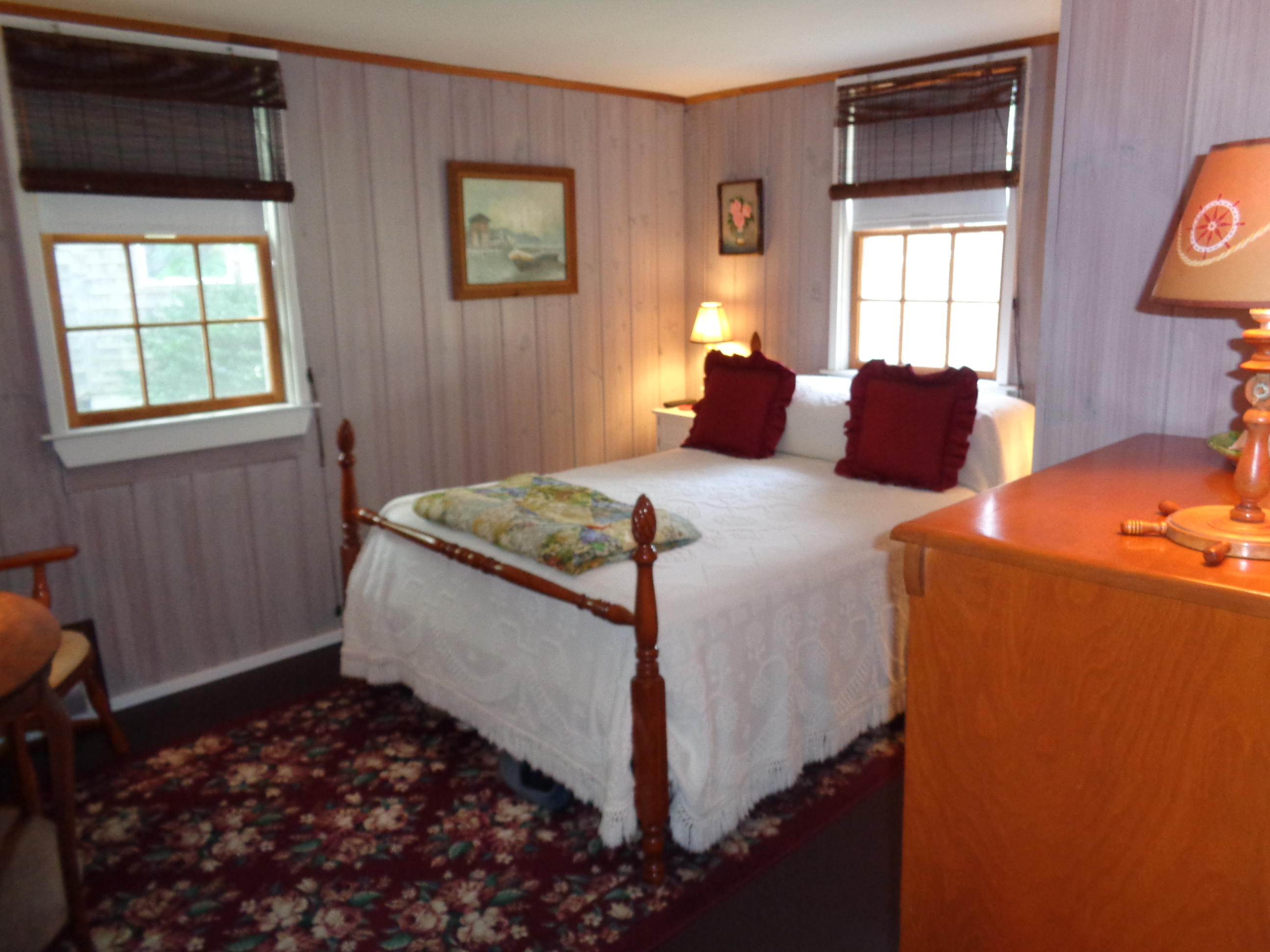 60 Designers Road, Unit C Wellfleet, MA 02667 - Photo 12 of 18 a bedroom with bed and a window