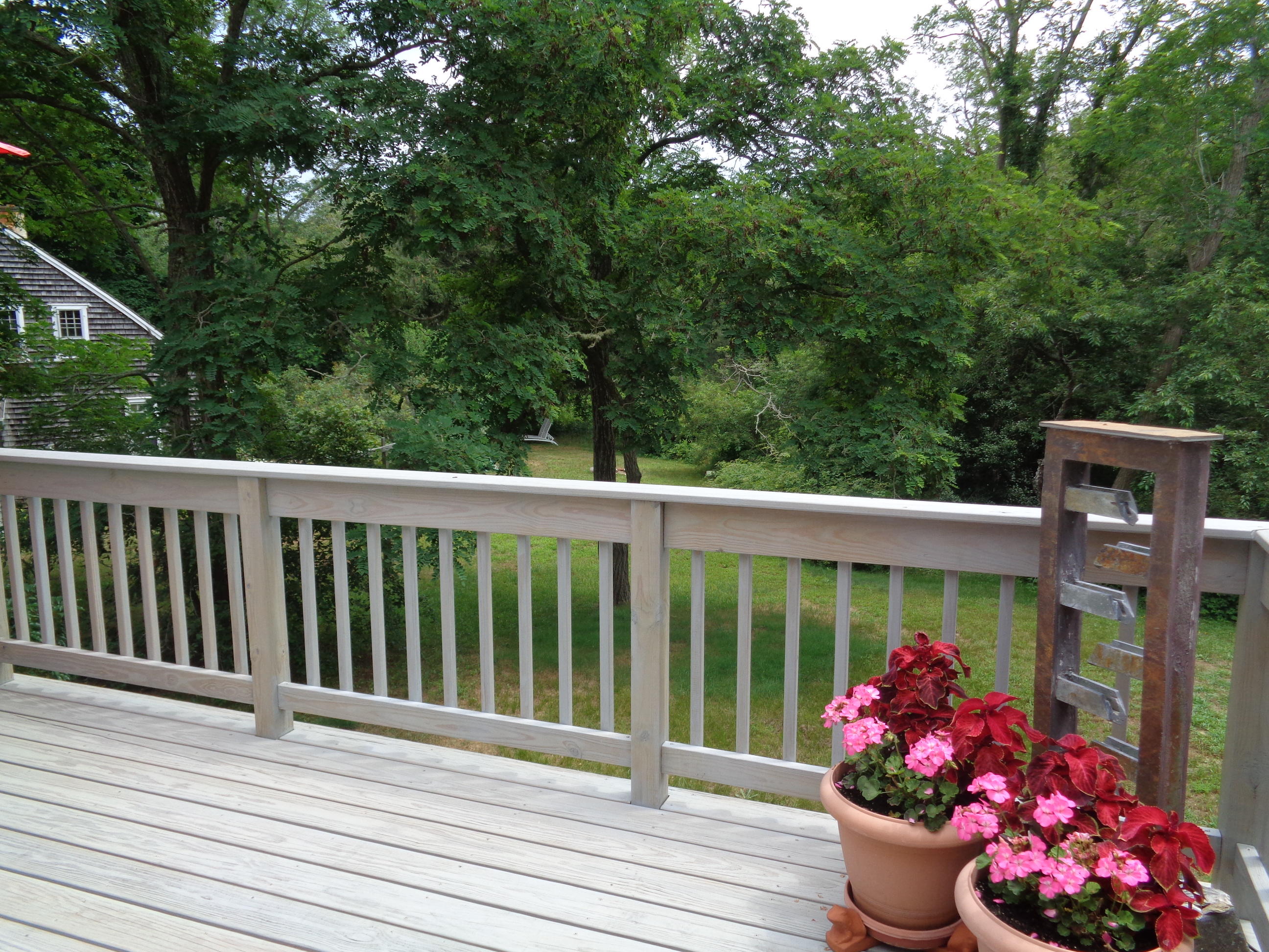 60 Designers Road, Unit C Wellfleet, MA 02667 - Photo 5 of 18 a view of a two chairs in the balcony