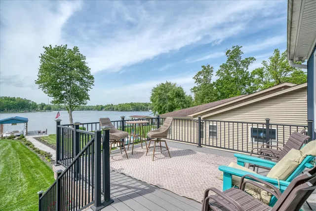 an aerial view of a house with outdoor space