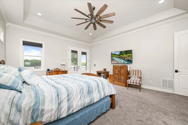 an aerial view of a house with outdoor space and street view