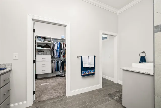 an aerial view of a houses with ocean view