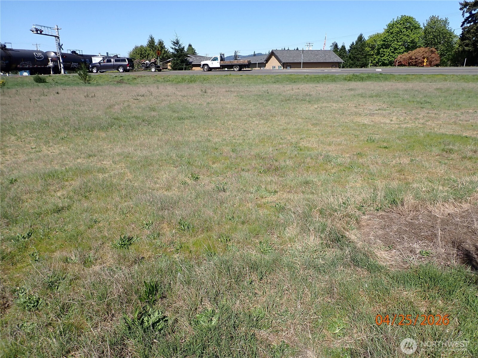 9217 183rd Avenue Southwest Rochester, WA 98579 - Photo 6 of 26 a view of a field with an ocean