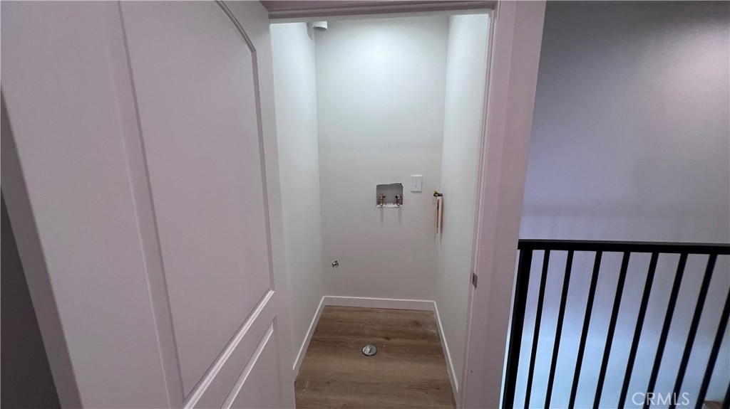 955 North Acacia Avenue, Unit B Compton, CA 90220 - Photo 14 of 15 a view of a hallway