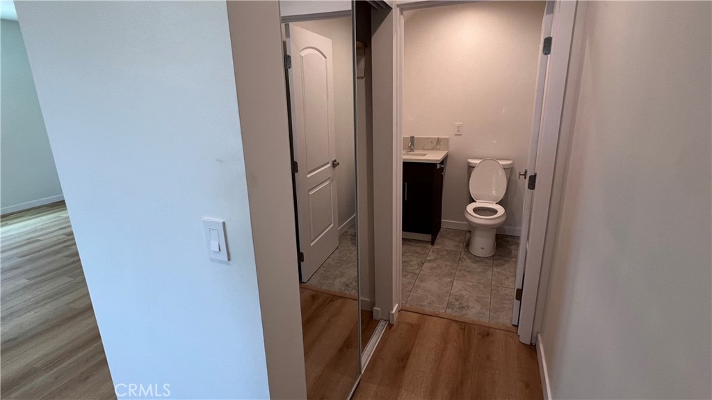 955 North Acacia Avenue, Unit B Compton, CA 90220 - Photo 4 of 15 a bathroom with a toilet and a sink