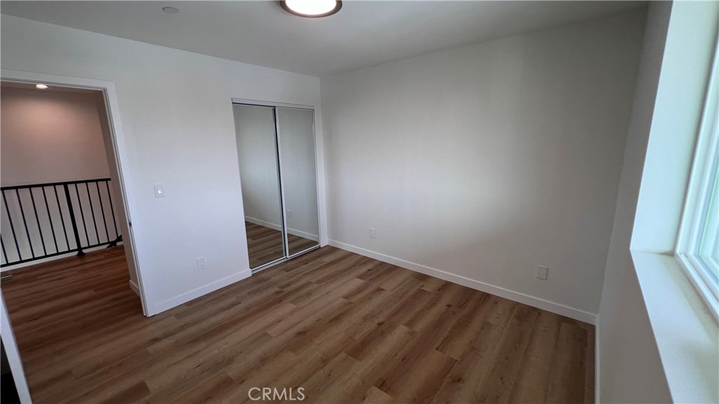 955 North Acacia Avenue, Unit B Compton, CA 90220 - Photo 10 of 15 a view of hallway with wooden floor