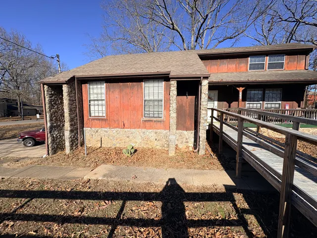 a view of a house with a porch