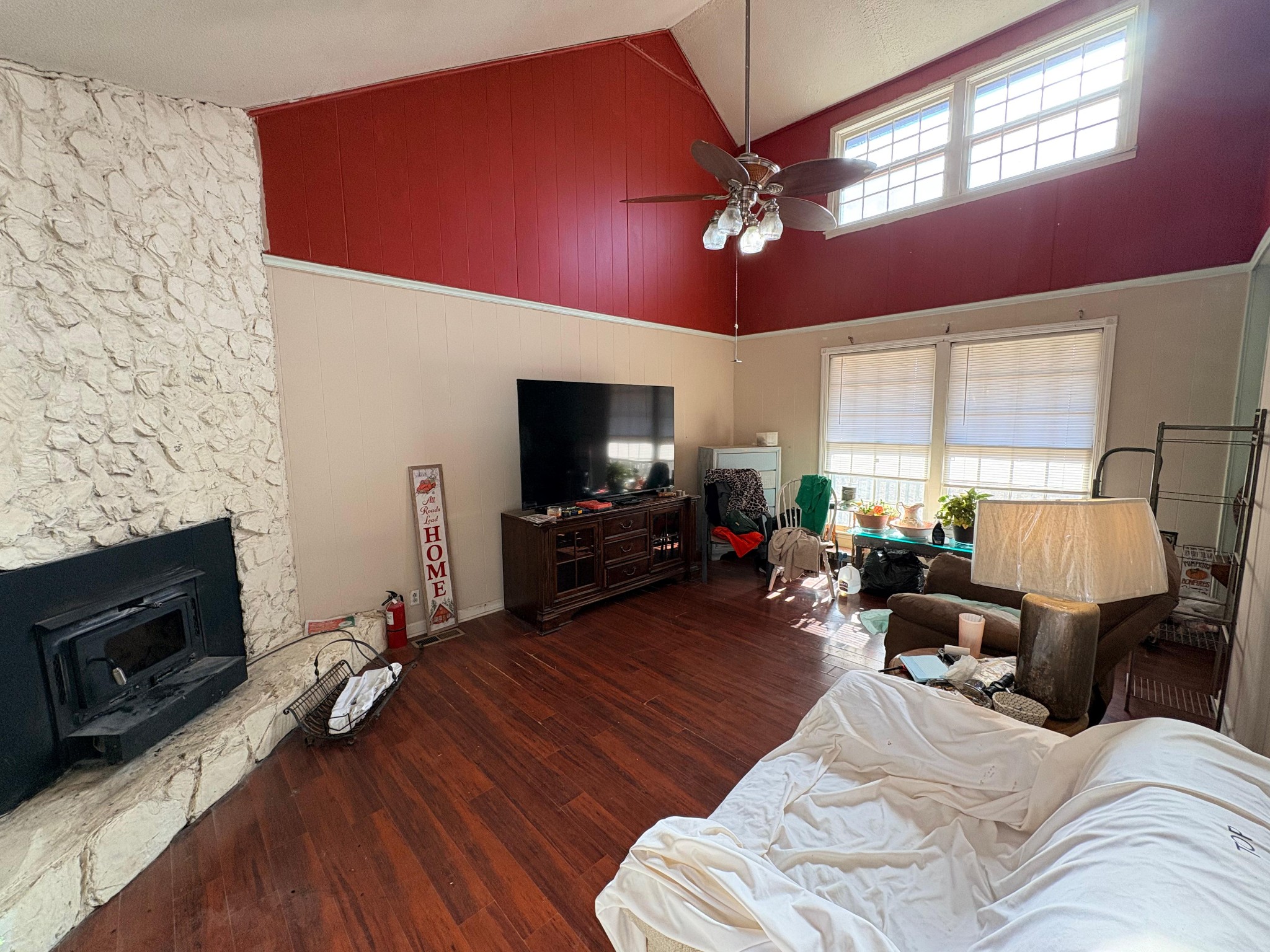 535 Inver Lane Clarksville, TN 37042 - Photo 2 of 10 a living room with furniture a flat screen tv and a fireplace