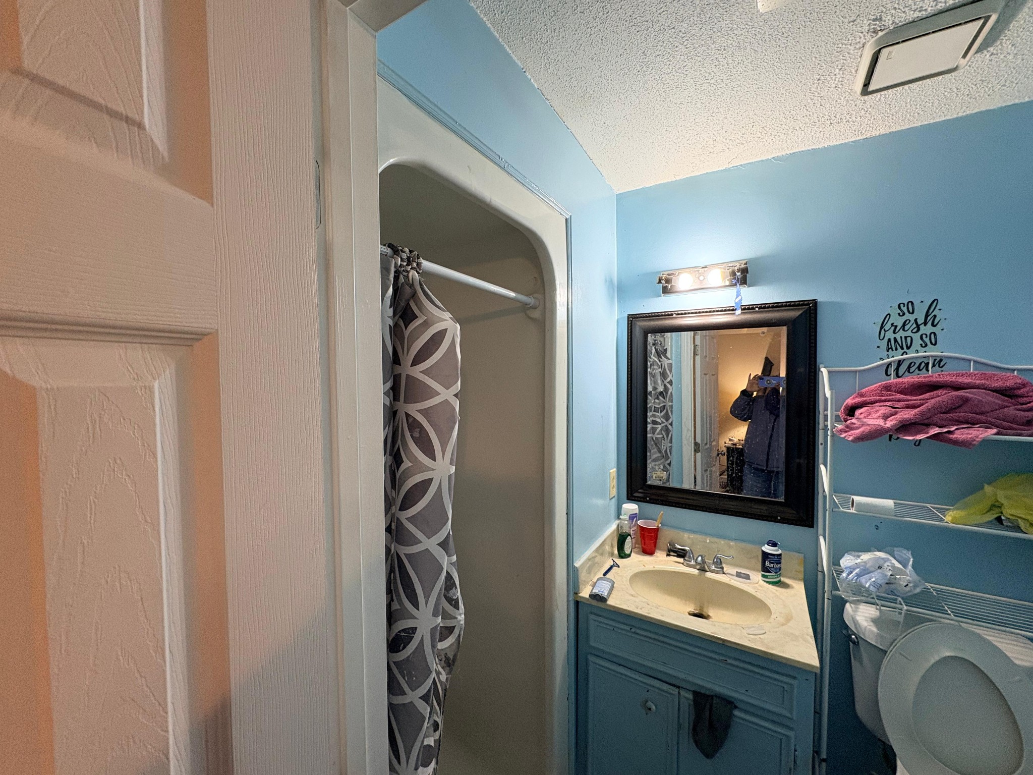 535 Inver Lane Clarksville, TN 37042 - Photo 8 of 10 a bathroom with a toilet sink vanity tub and mirror
