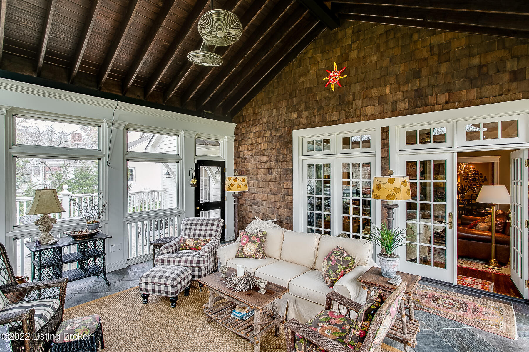 560 Sunset Road Louisville, KY 40206 - Photo 36 of 88 View of French doors to family room and door to deck with grill and table/chairs with access to kitchen.