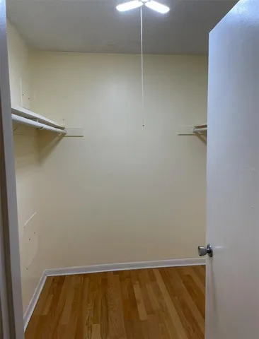a view of room with walk in closet
