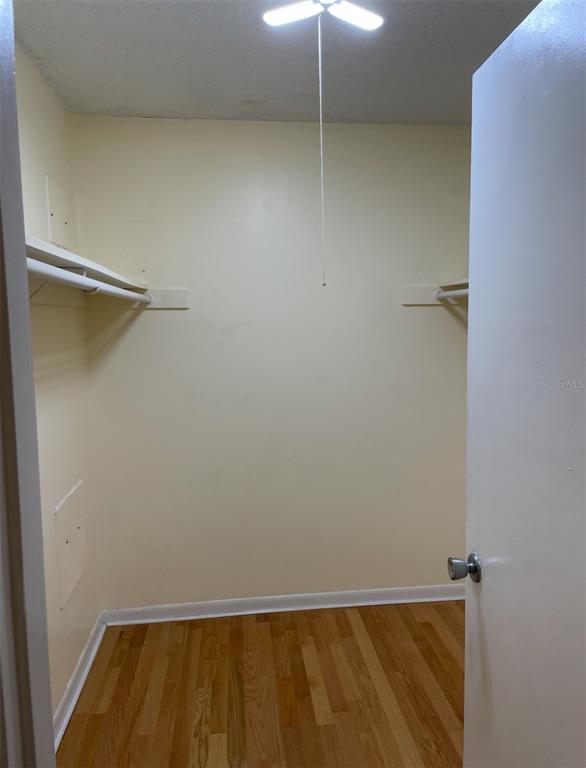6306 Newtown Circle, Unit 6C5 Tampa, FL 33615 - Photo 18 of 24 a view of room with walk in closet