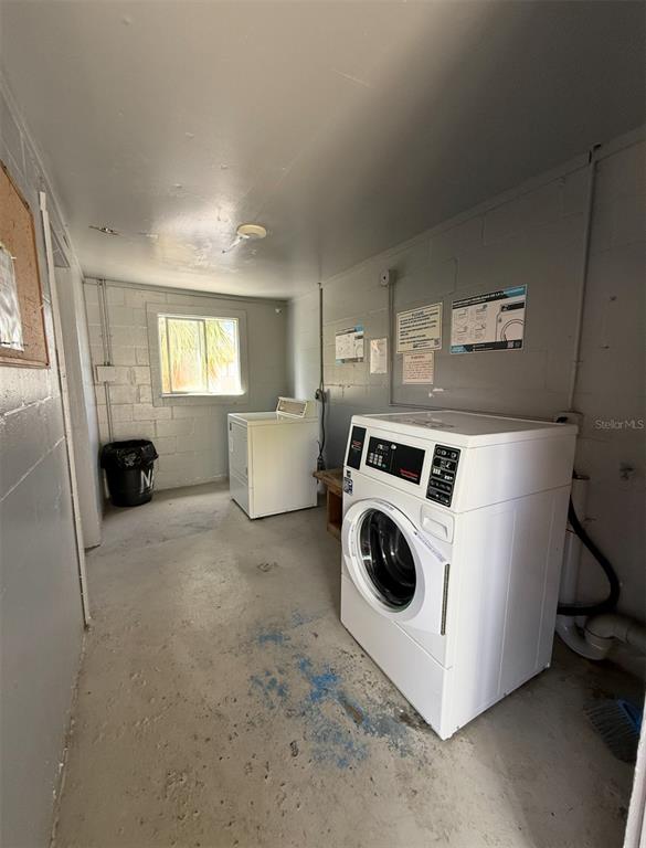 6306 Newtown Circle, Unit 6C5 Tampa, FL 33615 - Photo 24 of 24 a utility room with dryer and washer