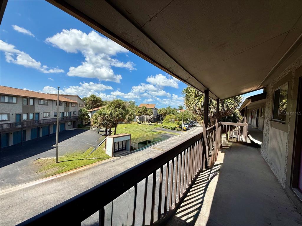 6306 Newtown Circle, Unit 6C5 Tampa, FL 33615 - Photo 7 of 24 a view of a balcony with chairs