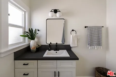 a bathroom with a toilet and shower