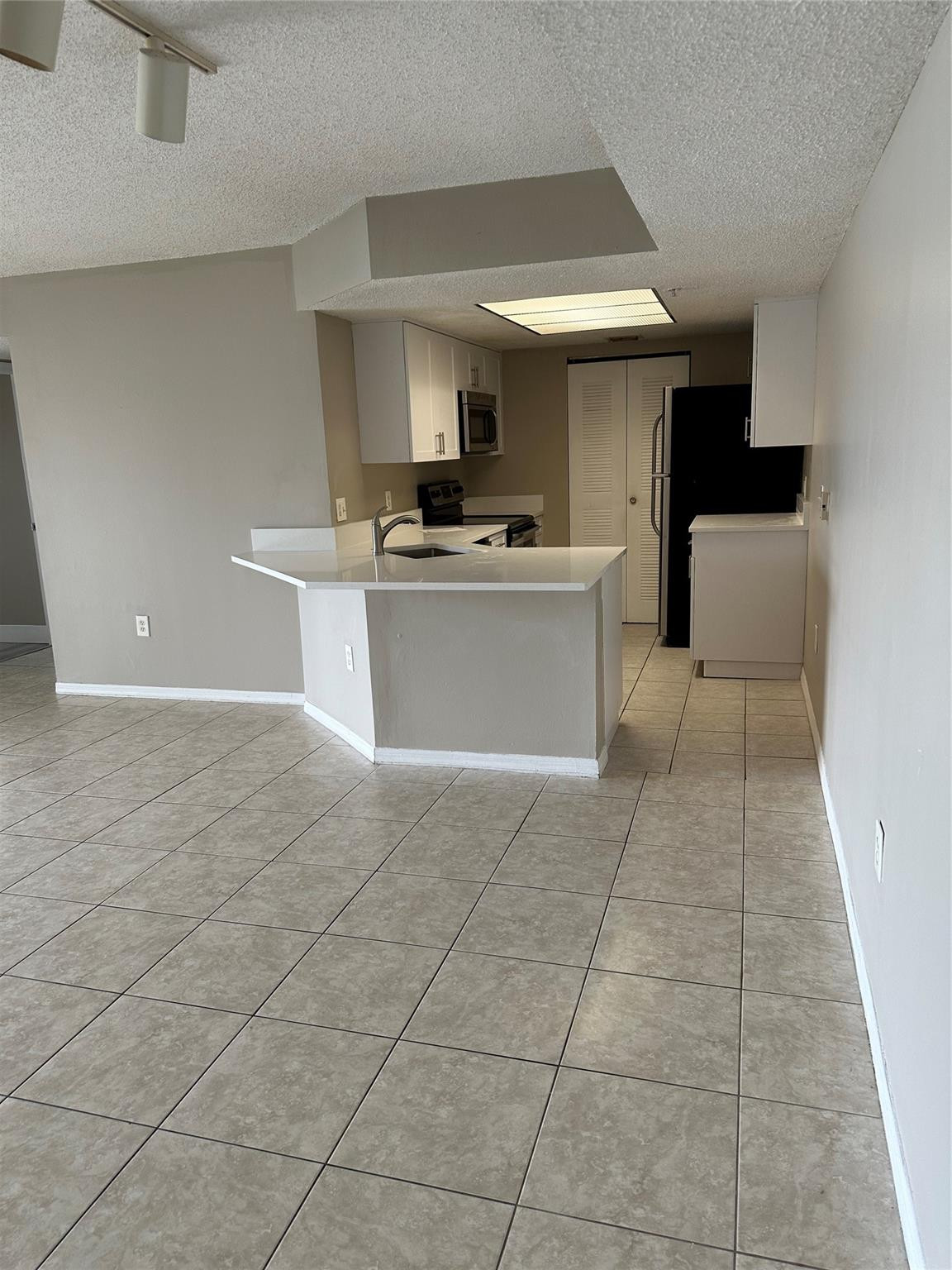 5065 Wiles Road, Unit 104 Coconut Creek, FL 33073 - Photo 2 of 16 Photo 2