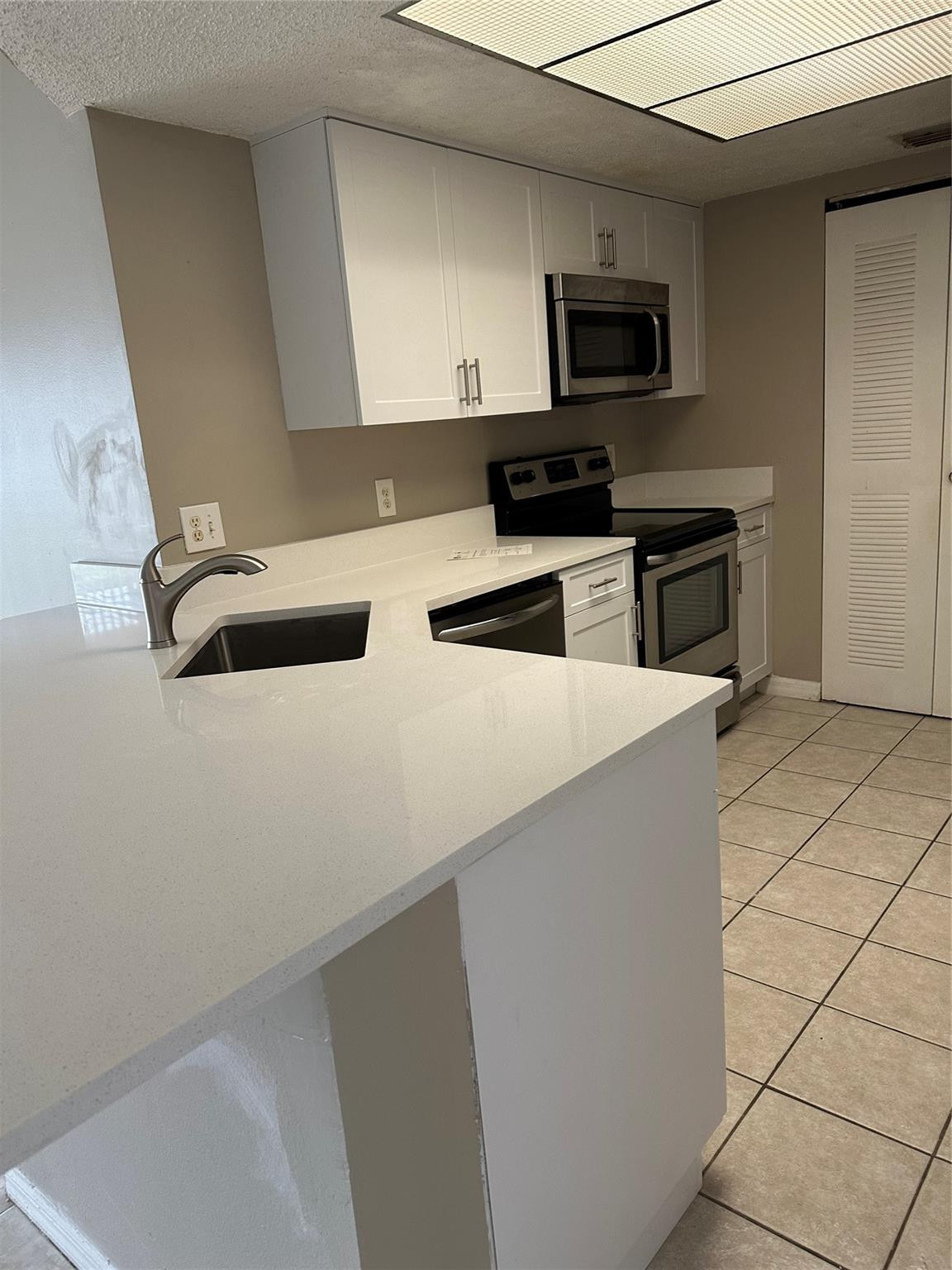5065 Wiles Road, Unit 104 Coconut Creek, FL 33073 - Photo 4 of 16 Photo 4