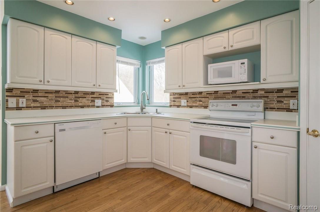 11104 Mcgregor Road Pinckney, MI 48169 - Photo 13 of 42 Lots of cabinet and counter space!