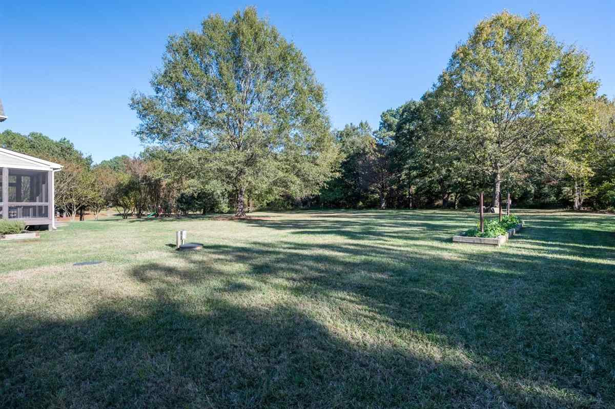 12904 Grovehurst Drive Raleigh, NC 27613 - Photo 27 of 30 This lot abuts an additional 1.5 acre HOA buffer for added privacy Exterior Back