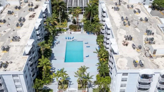 a view of swimming pool from a balcony