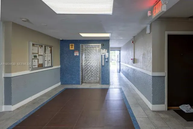 a view of gallery with stairs