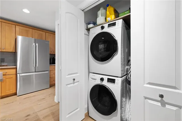 a view of a refrigerator in a kitchen
