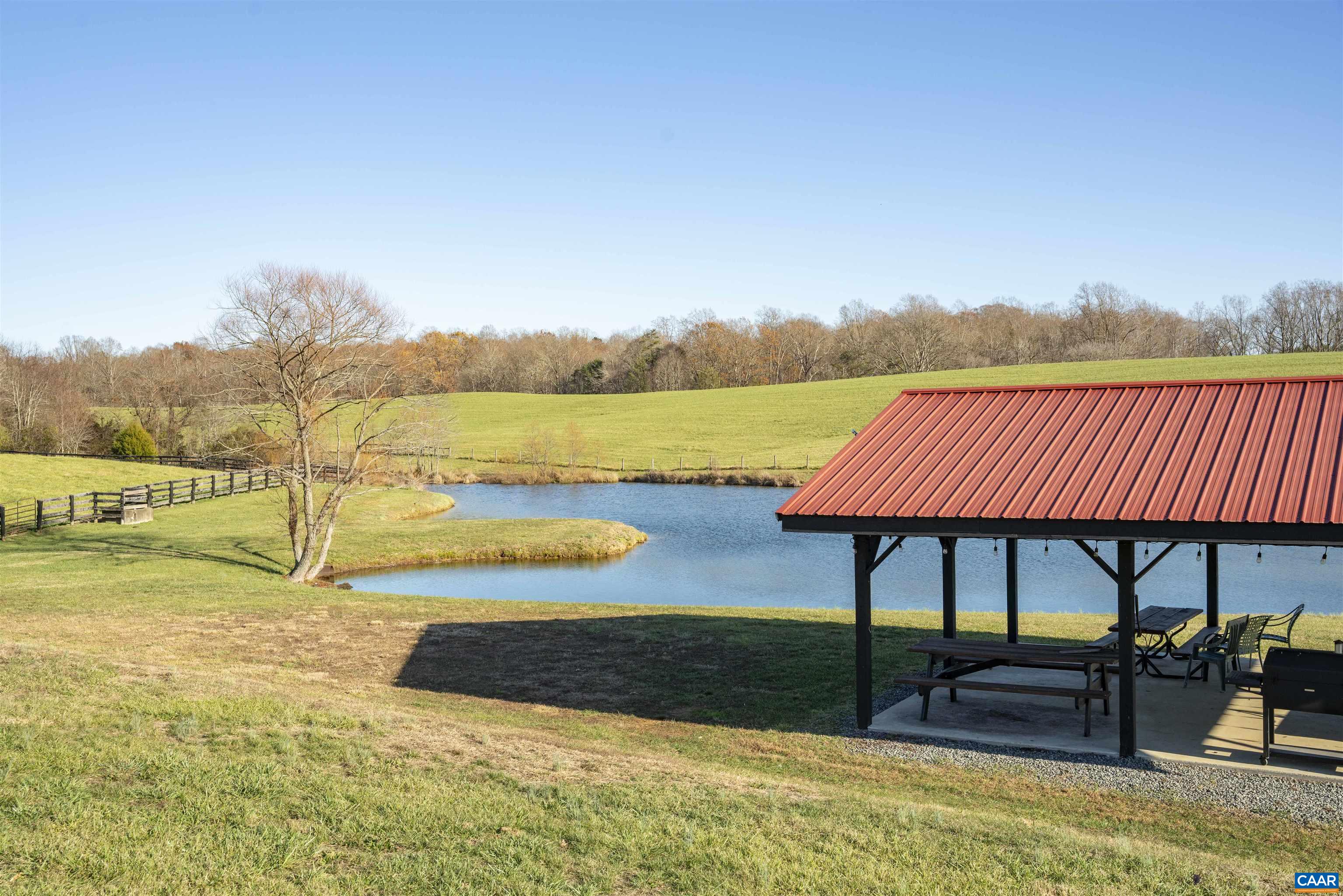 2427 South Blue Ridge Turnpike South Rochelle, VA 22738 - Photo 57 of 72 a view of swimming pool outdoor seating and lake view