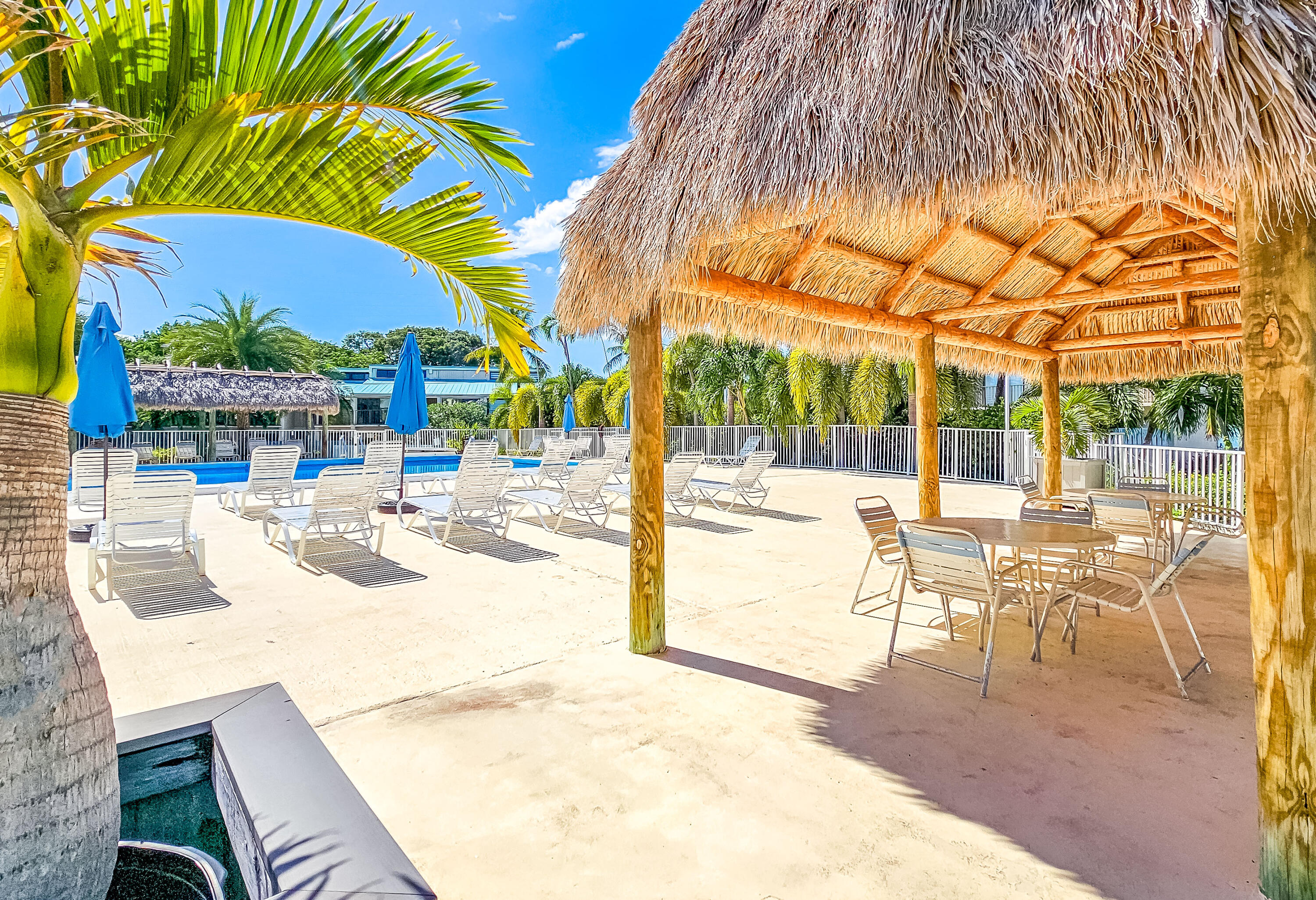 87200 Overseas Highway, Unit G5 Islamorada, FL 33036 - Photo 16 of 21 a view of a patio with swimming pool