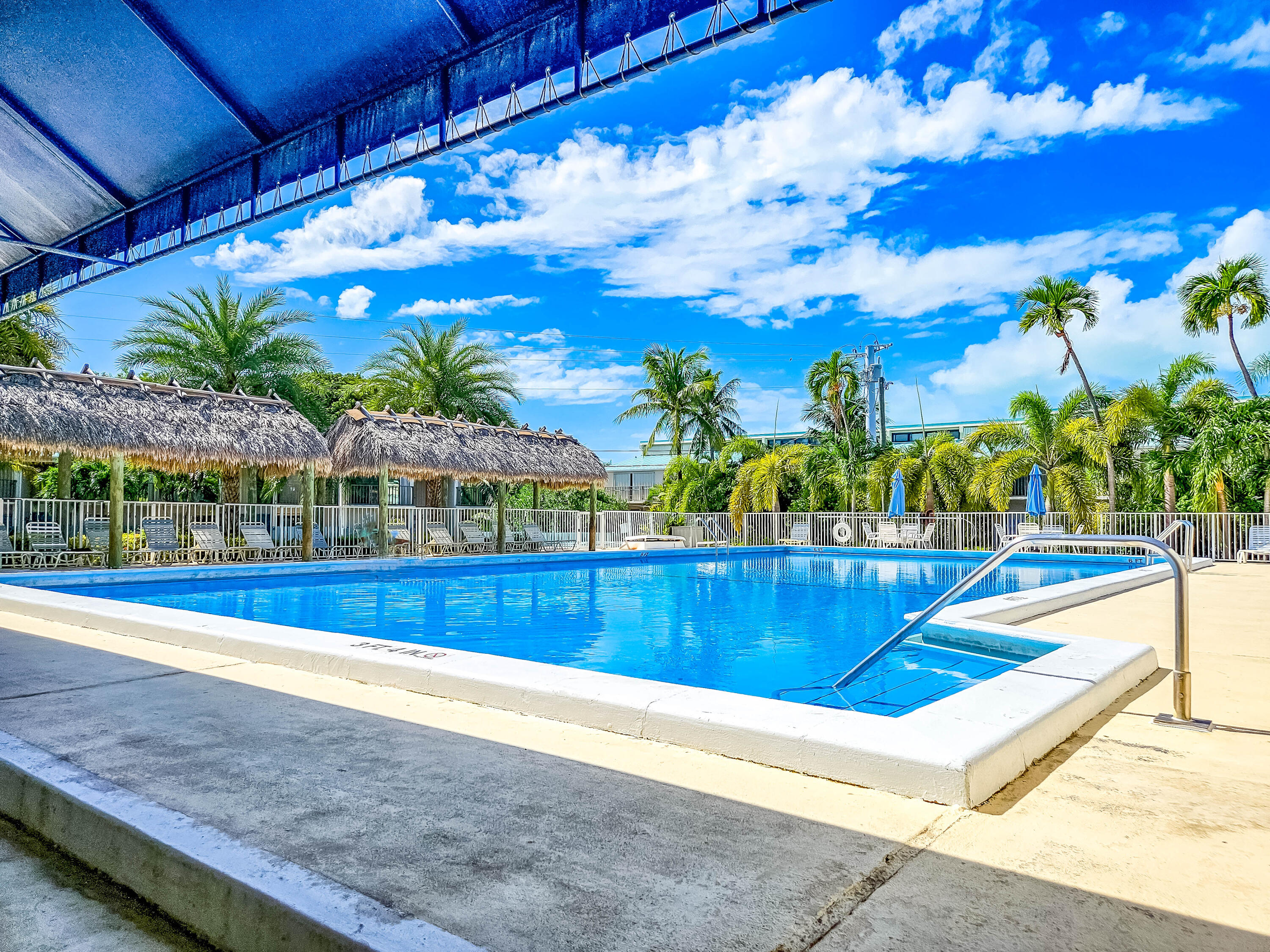 87200 Overseas Highway, Unit G5 Islamorada, FL 33036 - Photo 17 of 21 a view of swimming pool with outdoor seating