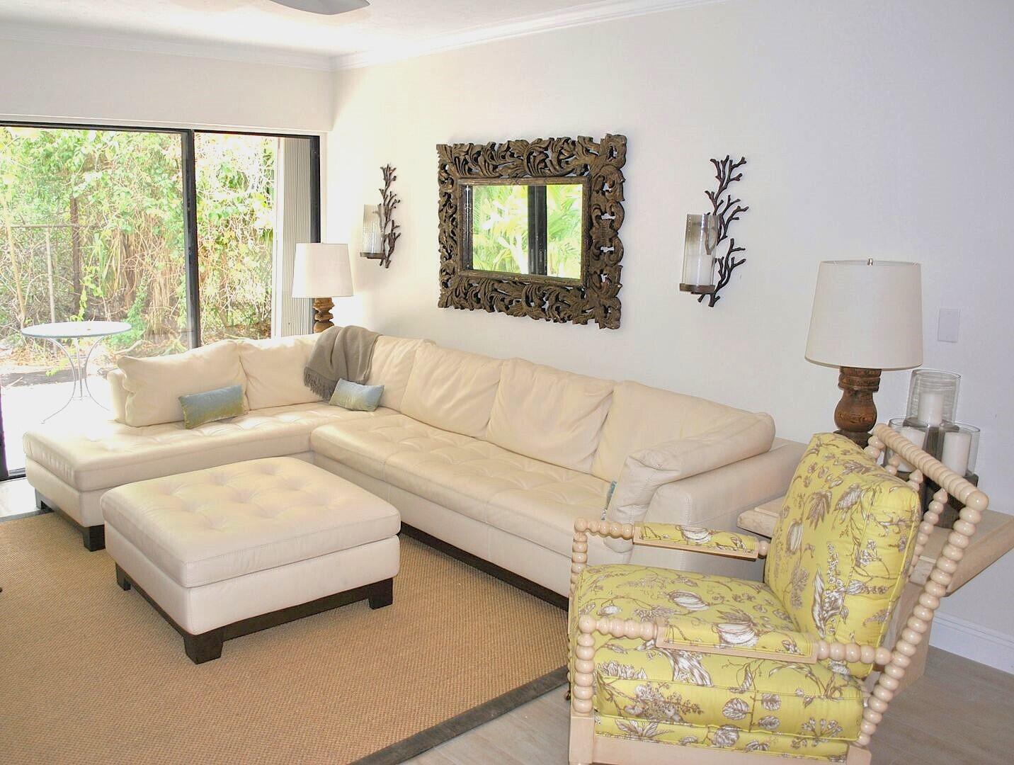 87200 Overseas Highway, Unit G5 Islamorada, FL 33036 - Photo 6 of 21 a living room with furniture and a large window