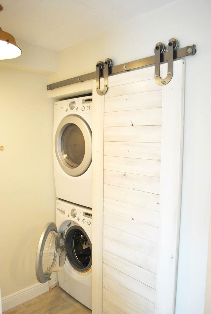 87200 Overseas Highway, Unit G5 Islamorada, FL 33036 - Photo 7 of 21 a utility room with dryer and washer
