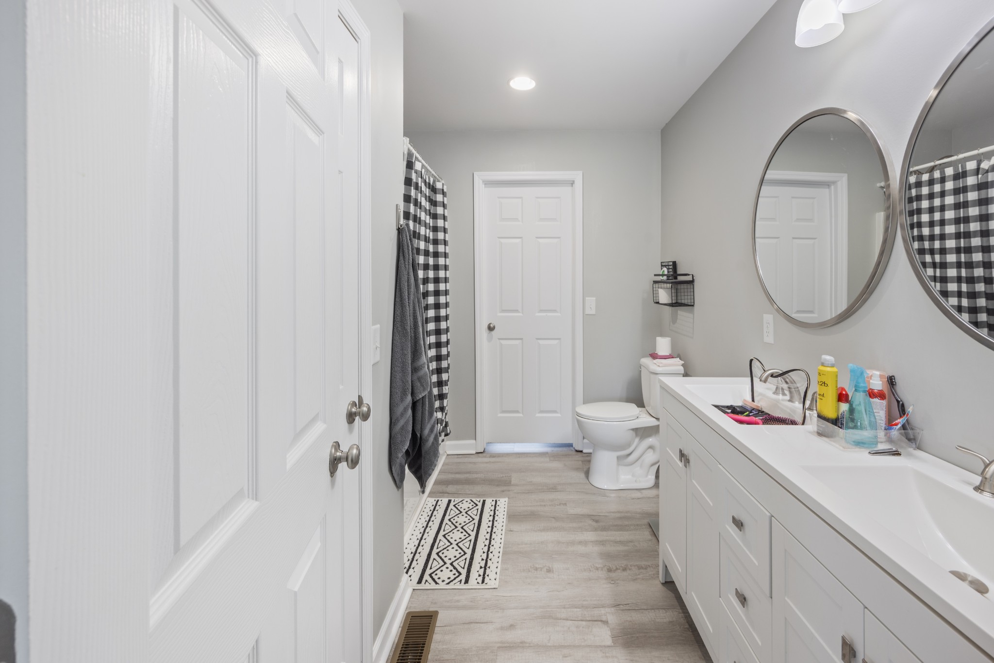 510 Highland Park Road Red Boiling Springs, TN 37150 - Photo 9 of 21 a bathroom with a sink mirror vanity and toilet